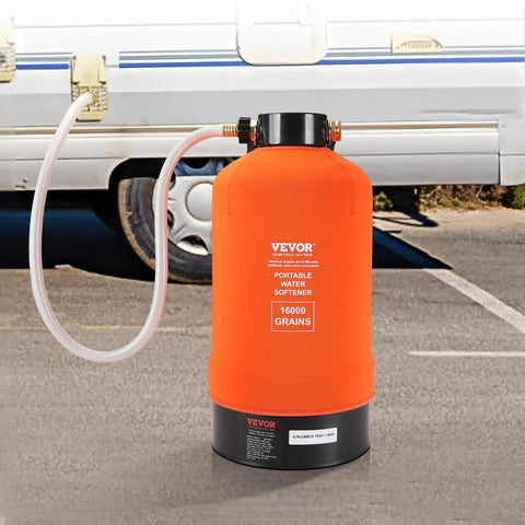 Portable 16,000 Grain RV Water Softener with three quarter inch brass fittings and forty two inch hose in front of an RV.