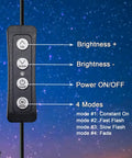 Remote control for 16.5 By 9 Inch Horizontal LED Open Sign For Biz with buttons for brightness and modes against starry sky