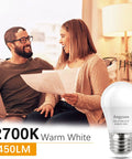 Smiling couple with documents beside 40W Equivalent A15 LED Bulb 120V Warm White 2700K Energy Saving E26 Base Pack of 4