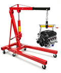 No Sweat 4400 Pound Engine Hoist Cherry Picker With Adjustable Telescopic Boom lifting an engine on six heavy duty wheels.