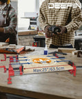 Heavy Duty Three Quarter Inch Pipe Clamps Set With Thirty Inch Pipe Two Pack Cast Iron Clamp Fixtures on a workbench
