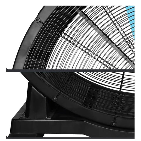 24 Inch Straight Up Heavy Duty Industrial Electric Floor Fan Rolling On Caster Wheels For Built Like A Tank Durability and Kickin Up Major Workshop Warehouse Cooling Performance side view showing steel housing and support base.