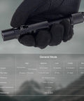 Gloved hand holding AA USB C Rechargeable Flashlight, 1018 Lumens Cool White Beam, 167 Meter Throw, IPX8 Waterproof