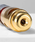 Close-up of the gold crimp terminal end of the Badass Multifunction Electric Wire Stripper And Crimper Tool Kit.