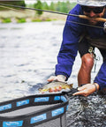 Floating Landing Net For Kayak Fishing With Rubber Coated Hoop And Foldable Telescopic Handle Ideal For Steelhead Salmon Trout Bass Catfish And Fly Fishing Lightweight Easy Grip Net For River Angling And Men Gift in use by fisherman catching trout in river