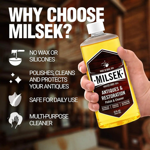 Hand holding a bottle of Antique Restoration Wood Polish And Cleaner with clear label featuring benefits and usage.