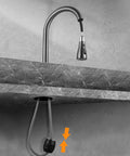 Universal Pull Down Faucet Hose Weight Ball For Kitchen Sink Sprayers And Bathroom Basins Heavy Duty Gravity Replacement, shown attached to a kitchen faucet.