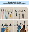 4 Pack Wall Hooks Set, Heavy Duty Metal Coat Hangers In Black, Wall Mounted With Screws, holding coats, towels, and keys.