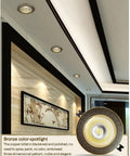 Round Brushed Brass Led Recessed Downlight Featuring Sleek Dark Baffle Trim Dimmable Ceiling Fixtures Quick Clip In Setup Sweet Glow For Any Room Without Sweat Or Complicated Wiring in modern ceiling design.
