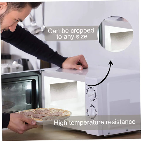 Man using microwave with 10 Piece Microwave Waveguide Covers Set 5.9 By 4.7 Inches Each Mica Sheet Easy To Cut Go To Replacement Heat Insulation