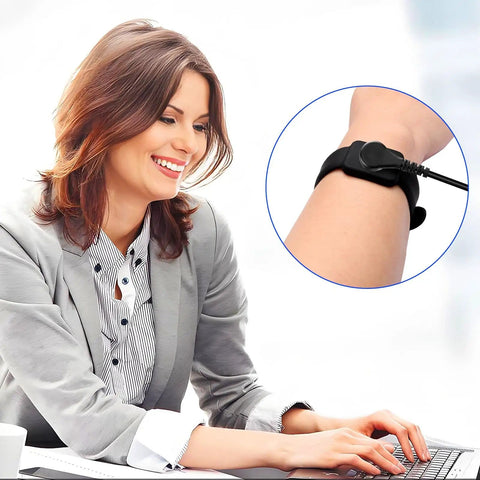 Woman using laptop with Go To ESD Wrist Strap And Grounding Cord Bundle with 3.5mm Snap And 3m Cable for anti-static protection.
