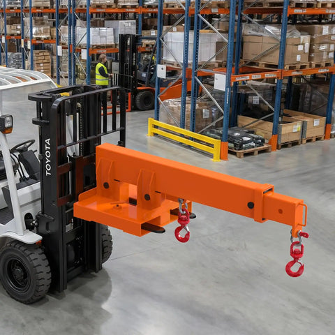 Heavy Duty Forklift Jib Boom Crane Attachment With No Fuss Tool Free Setup And Rock Solid Steel Build For Swift Rigging Up To 5511 Pounds Load Capacity Featuring Dual Swivel Hooks And Flexible Angles mounted on a forklift in a warehouse.