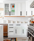 Modern kitchen with T Bar Cabinet Pulls 10 Pack 7-1/2 Inch Hole Center Oil Rubbed Bronze Drawer Handles installed on white cabinets.