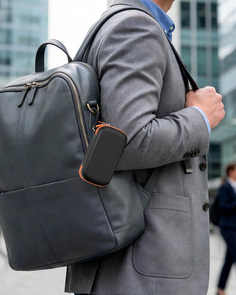 Man carrying backpack with Rugged EVA Travel Case For SanDisk Extreme Portable SSD And Pro Portable SSD 500GB To 8TB, Shockproof Hard Case attached.