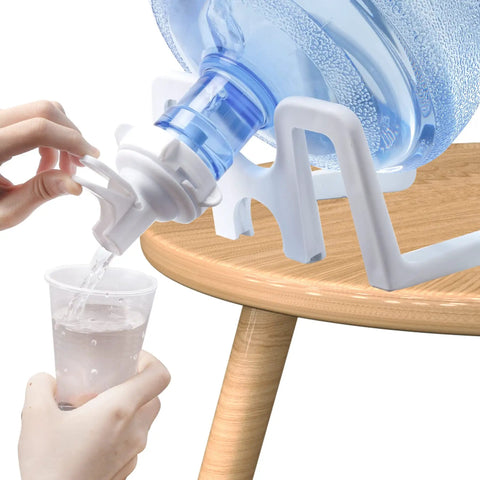 Two Pack Water Dispenser Valve For Five Gallon Jugs, Food Grade PP, Reusable And Built To Last For Office Home Camping Events, Fits Most Dispensers, Easy Install, Leak Free And Mess Free. 55mm crown-top jug pouring water into cup