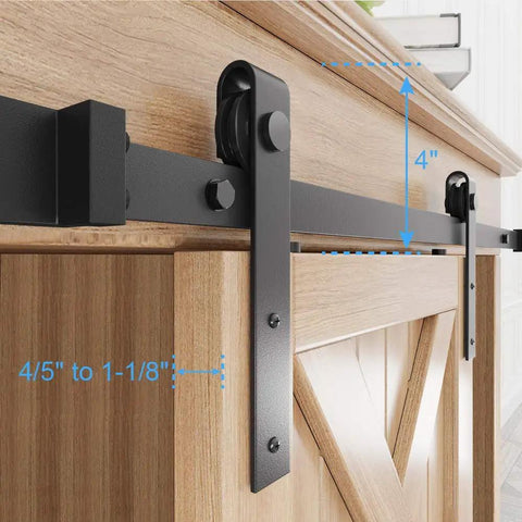 Close-up of 5.5 Foot Sliding Barn Door Hardware Kit with J shape hanger on a wooden cupboard, showing installation dimensions.