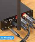 Rear view of BT10A Bluetooth 5.0 Stereo Amplifier Receiver 2 Channel Class D Mini Hi Fi Integrated Amp with connected audio cables