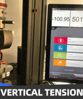 Vertical tension testing machine with metal clamp and specimen holder; digital readout on screen