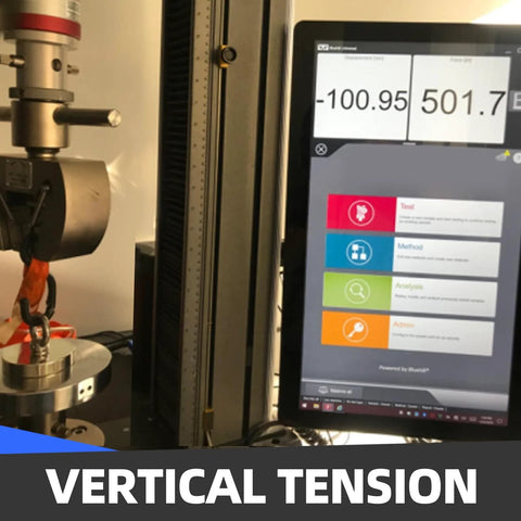 Vertical tension testing machine with metal clamp and specimen holder; digital readout on screen