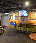 Interior view of a bar with Heavy Duty Par30 Short Neck Flood Bulb Cranks Out A Bold 1000 Lumens Of Smooth 3000k Warm White Glow.