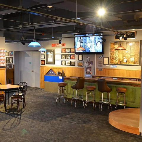 Interior view of a bar with Heavy Duty Par30 Short Neck Flood Bulb Cranks Out A Bold 1000 Lumens Of Smooth 3000k Warm White Glow.