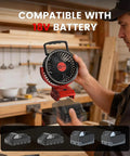 Person holding Cordless 5 Inch Jobsite Fan For Milwaukee 18V Battery with brushless motor and LED indicator in workshop