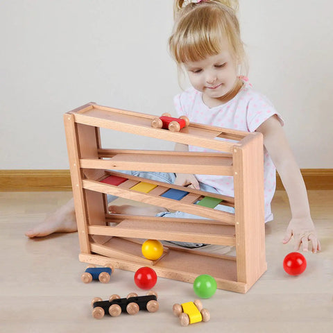 Child playing with Wooden Race Track Ramp Toy For Toddlers 5 Level Car Ramp Set With 4 Wood Cars And 3 Balls No Assembly