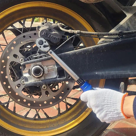 Using Click Torque Wrench Three Eighths Inch Drive Pro Grade With 72-Tooth Ratchet on motorcycle wheel