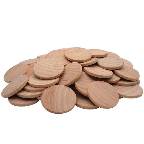 Sixty Pack Of Two Inch Natural Wood Slices Ideal For DIY Crafts And Seasonal Decor Unfinished round wood coins stacked together.