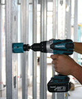 Rock Solid Eighteen Volt Cordless Hammer Driver Drill Kit Featuring Killer Torque Two Speed Gears and Hella Durable Ergonomic Build in use.