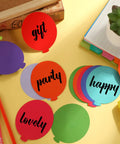 Colorful Balloon Cutouts For Classrooms And DIY Projects, 108 Assorted Hot Air Balloon Die-Cuts With 120 Glue Points on desk