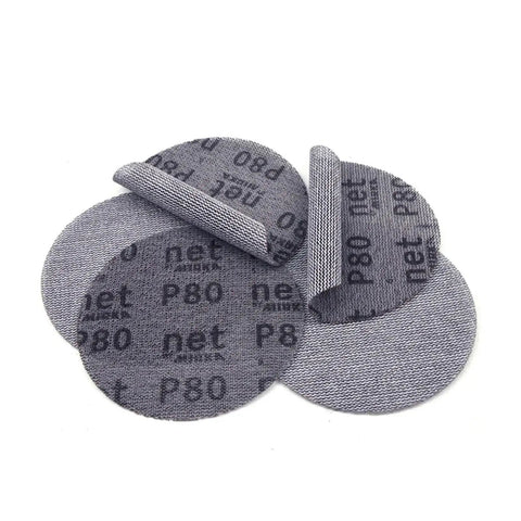 Get Some Smooth Finish With These 20 Piece 3 Inch Mesh Sanding Discs Offering Sweet Anti-Blocking Action From 80 To 240 Grit Plus Dust Vent Holes For Cleaner Work on Both Wood And Metal Projects Today. Close-up of P80 grit mesh sanding discs.