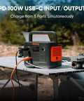 Solar Generator 240 V2 With 256Wh LiFePO4 Battery And 300W AC 100W USB C Output on outdoor table with drone.