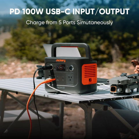 Solar Generator 240 V2 With 256Wh LiFePO4 Battery And 300W AC 100W USB C Output on outdoor table with drone.