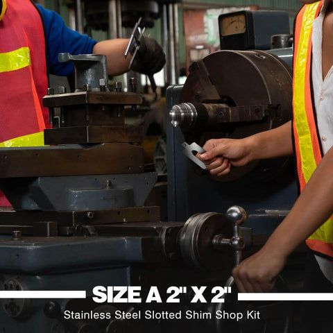 Two workers using 80 Piece Set Stainless Steel Slotted Shims Kit 2 by 2 Inch for machinery leveling