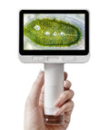Hand holding Awesome Kids Handheld Microscope For Learning And Discovery, Portable Miniscope With 4 Inch IPS Display And 1080P Imaging, 100X-1600X Magnification, Kid-Friendly Pocket Microscope For Boys And Girls, Educational Science Kit, Hands-On Exploration