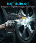 Badass Cordless Impact Wrench Featuring A Brushless Motor That Cranks Out Knockout Torque With Tough As Nails Build Quality Built Like A Tank For Rugged Jobsites And Makita 18V Battery Compatibility, showing use under car wheel with LED light.