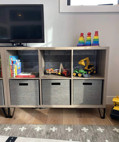 Toy-filled cabinet with 10 Inch Trapezoid Hairpin Furniture Legs Set Of 4, Solid Cold Rolled Steel, Black Finish, supports TV stand