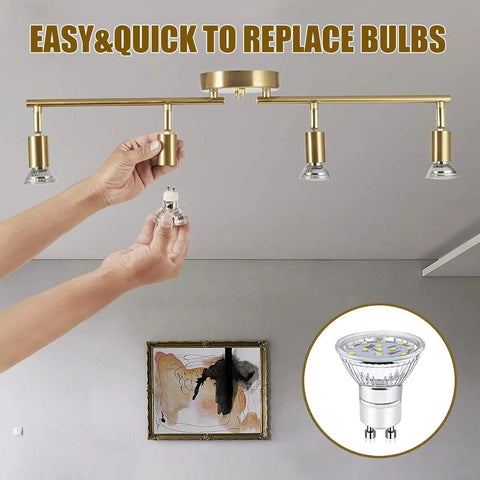 Gold Finish LED 4 Light Track Lighting Kit With Rotatable Heads And Foldable Track Fixtures easy bulb replacement shown