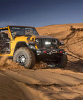 Red Soft Shackle Set With Protective Sleeve 57,000 Lbs Breaking Strength towing yellow 4x4 in sandy desert