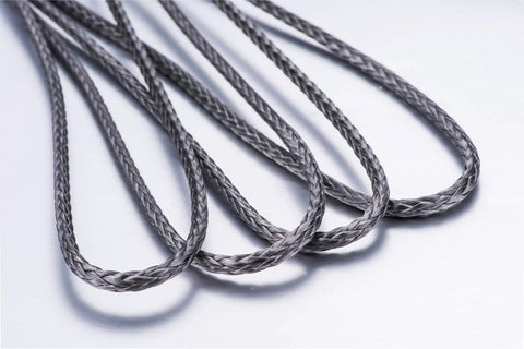 Close-up of Synthetic Winch Cable Rope 3/8 Inch By 85 Feet With Black Protective Sleeve for Off Road 4x4 Trucks Jeeps SUVs Boats.