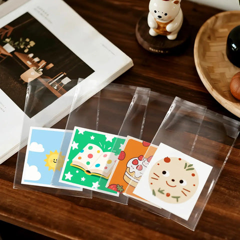 Self Sealing Clear 6 By 9 Inch Cellophane Bags Pack Of 200 For Cookies Snacks Bakery Gifts Envelopes Small Parts With Resealable Adhesive And Scalloped Edges For Easy Grab-And-Go Packaging, clear sleeves holding cards