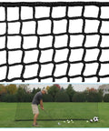 Beefy 10x10ft Heavy Duty Golf Practice Net With High Impact Nylon Netting shown in backyard setup with golfer