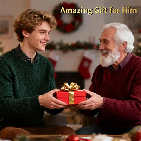 Young man giving a wrapped gift to an older man, both smiling, in a festive setting.