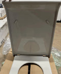 Slick Pillow Talk Toilet Seat In Clean Ice Grey Featuring Smooth Soft Close Hinges, top loading mount design on cardboard.