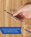 Using Beefy Dual Head Nail Setter And Hinge Pin Punch Set Kit on wood surface, close-up of tool impact at contact point.