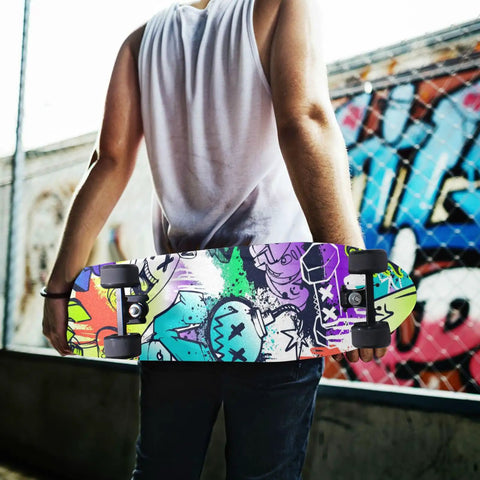 Person holding a skateboard with Street Art Graffiti Grip Tape For Skateboards And Longboards, Bubble Free Anti Slip Deck Sheet 33 X 9 Inches