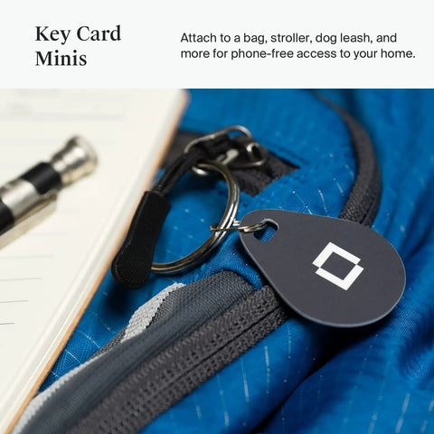 Key Fobs Four Pack NFC Enabled for Level Lock Plus Smart Locks Grey clipped to a blue bag, easy phone-free access on the go