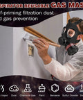 Person painting wall while wearing Full Face Respirator Mask With 40mm Activated Carbon Filter Reusable Dust Gas Chemical Vapor Fume