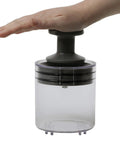 Hand pressing Deluxe Bearing Packer for quick grease flush and repack, universal fit for bearings up to 3.5 inches, durable polycarbonate